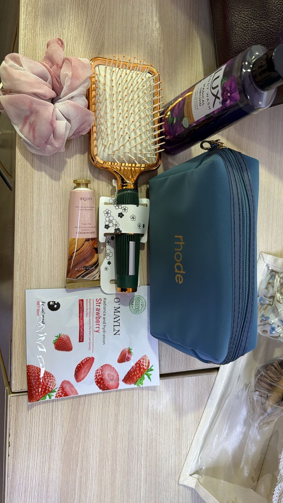 Teej gift hamper with personal-care items and pouch